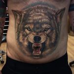 Scary realistic wolf tattoo by Vid Blanco. #VidBlanco #photorealism #realism #UKtattooer #minimalpalette #blackandgrey #wolf