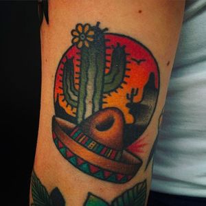 Solid cactus and sombrero tattoo done by Moira Ramone. #MoiraRamone #25toLife #traditionaltattoo #sombrero #cactus #desert