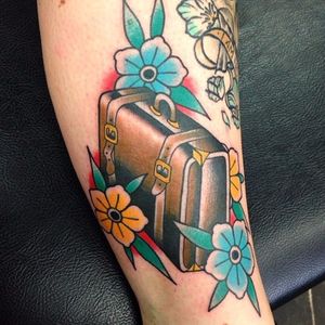 Suitcase Tattoo by Jed Harwood #suitcase #wanderlust #traveltattoos #traditional #JedHarwood