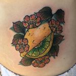 Neo traditional flower and lemon tattoo by Ashley Lehman. #neotraditional #flowers #lemon #citrus #AshleyLehman
