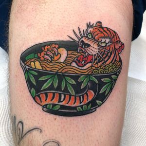 Tiger ramen tattoo by Tom Tom Tattoo #TomTomTattoo #cattattoos #color #Japanese #traditional #mashup #ramen #foodtattoo #tiger #junglecat #cat #soup #noodles #bowl #leaves #egg #food