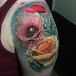 Flower tattoo by Mark Wade #MarkWade #flowertattoos #color #realism #realistic #hyperrealism #painterly #rose #pearls #leaves #nature #poppy #floral #babysbreath #flowers #tattoooftheday