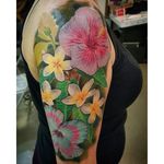 Color realism frangipani and hibiscus tattoo half sleeve by Andy Nava. #realism #colorrealism #flower #frangipani #hibiscus #AndyNava