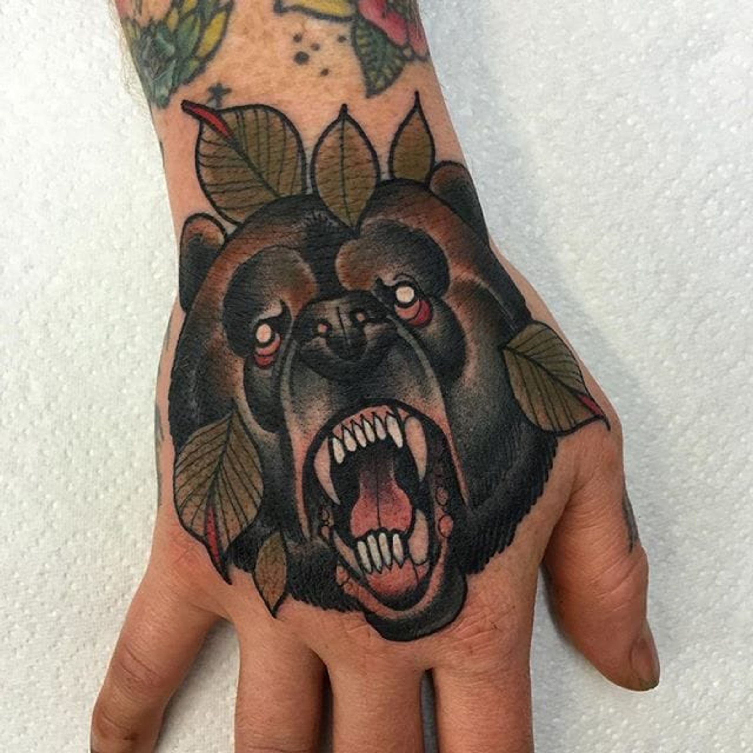 Tattoo uploaded by Robert Davies • Bear Hand Tattoo by Mitchell