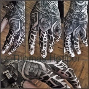 Blackwork Hand Tattoo by Thomas Hooper #blackwork #blackworkhand #blackworkhandtattoo #blackworktattoos #blackworkartists #hand #handtattoos #dotwork #dotshading #ThomasHooper