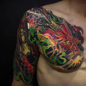 Beautiful looking neo japanese style dragon tattoo by Camoz. #camoz #coloredtattoo