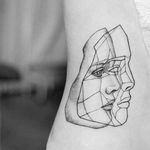 Low poly portrait tattoo by Uls Metzger. #UlsMetzger #dotwork #pointillism #blackwork #face #geometric #lowpoly
