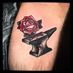 Classic rose and anvil Tattoo by @Capratattoo #Capratattoo #traditional #black #red #SkullfieldTattoo #rose #anvil