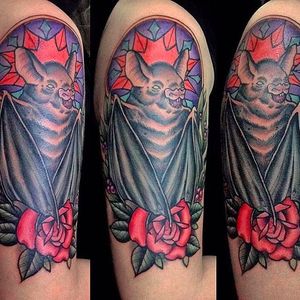 Incredible detail and clean execution on this bat half sleeve tattoo by Jan Fresco. #toxic #JanFresco #goodhandtattoo #neotraditional #coloredtattoo #bat #rose #halfsleeve