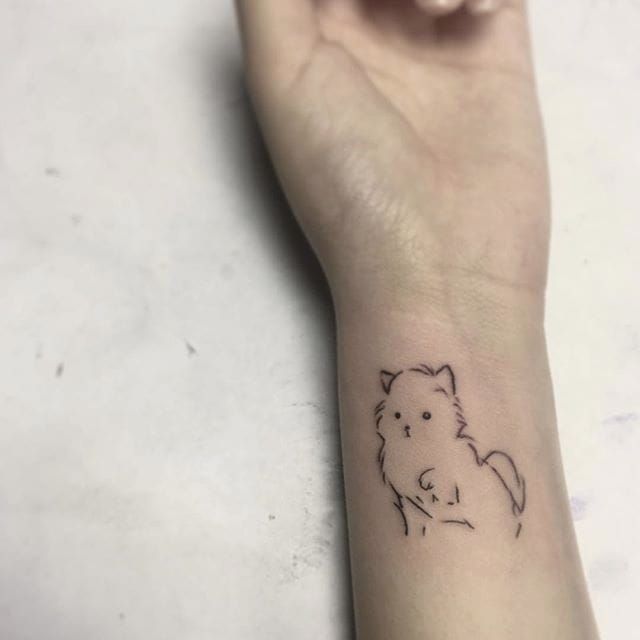 Tattoo uploaded by Xavier • Minimalist cat tattoo by Benjamin Fly.  #BenjaminFly #blackwork #minimalist #cat #subtle #cute #pet • Tattoodo