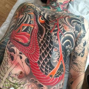 Incredible strong snake in this full body piece in progress. Tattoo by Chris O'Donnell. #ChrisODonnell #TraditionalJapanese #KingsAvenueTattoo #NewYorkTattooer #oriental #easternculture #snake #asianart