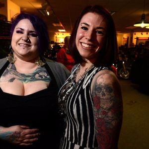 Tattoo artist Coral Petrie poses with her loyal client Rebecca Boyer Photography courtesy of Bob Hallinen at the Alaska Dispatch News #BobHallinen #ADN