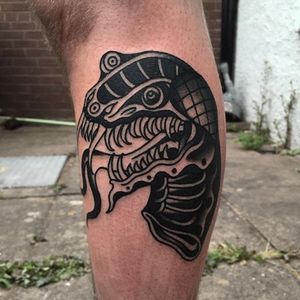 Snake tattoo by Will Geary #traditional #traditionaltattoo #blackwork #blackworktattoo #boldtattoos #snaketattoo #blackworksnaketattoo #snakeheadtattoo #WillGeary