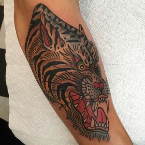Tiger via instagram mikeyholmestattooing #tiger #traditional #cat #color #bigcat #MikeyHolmes