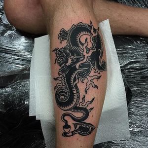 Dragon Tattoo by Sway Tattooer #blackworkdragon #blackwork #AmericanTraditional #traditionalblackwork #SwayTattooer