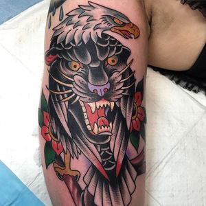 Panther eagle tattoo by Travis Costello. #traditional #TravisCostello #panther #eagle #bird