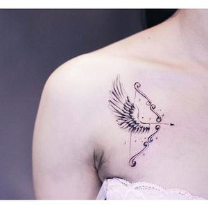 Subtle arrow tattoo combined with a wing design via Instagram @helenxu_tattoo #linework #subtle #arrow #wings #HelenXu #finelines