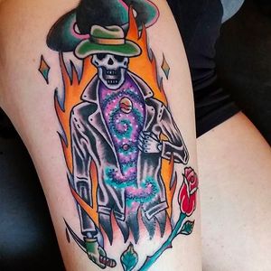 Radical looking galactic skeleton man. Tattoo done by Douglas Grady. #DouglasGrady #traditionaltattoo #coloredtattoo #brightandbold #skeleton #rose #galactic