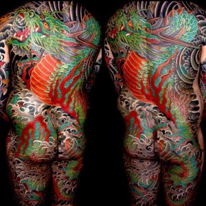 A bodysuit featuring a green dragon by Mike Rubendall (IG—mikerubendall). #dragon #Irezumi #Japanese #MikeRubendall #traditional