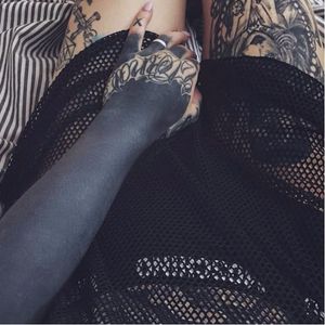 Black arm tattoo on a girl by unknown artist #tattooedgirls #black #blackwork #allblack #sleeve #blackout