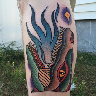 Tatuaje de dinosaurio por Vinny Morris