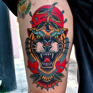 Brutal looking tiger tattoo by Chris Papadakis. #ChrisPapadakis #traditionaltattoo #tiger