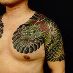 Dragon tattoo by Damien Rodriguez #damienrodriguez #dragontattoos #Japanese #dragon #waves #cherryblossoms #scales #wings #mythicalcreature #legend #myth #mystical #folklore