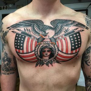 An epic bald eagle chest-piece by Rich Hadley (IG—richhadley). #AmericanFlag #baldeagle #ladyhead #RichHadley #patriotic #traditional