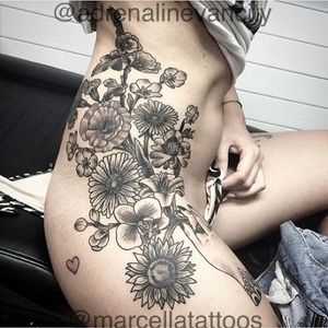 Black and grey hand holding a bouquet side piece by @marcellatattoos. #bouquet #flowers #floral #botanical #blackandgrey #hand #marcellatattoos