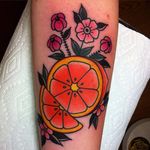 Traditional style flowery citrus tattoo by Nelson Dinsdale-Young.  #orange #citrus #fruit #traditional #floral #NelsonDinsdaleYoung
