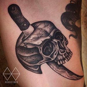 Cool jawless skull with machete by Monkey Bob. #Monkeybob #black #tattoo #skull #machete