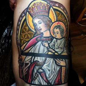 A gorgeous stained glass tattoo by Mikael de Poissy (IG—mikaeldepoissy). #blessedchild #Christian #MikaeldePoissy #neotradtional #religious #stainedglass #queen