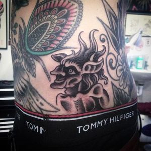 Solid looking little demon tattoo by SImon Erl. #SimonErl #blackwork #traditionaltattoos #blacktattoos #DHARMAtattoo #demon #devil
