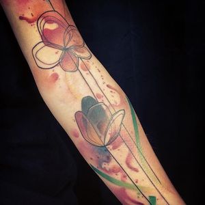 Abstract Watercolor Tattoo by Belly Button #Abstract #Watercolor #AbstractWatercolor #WatercolorTattoos #WatercolorArtists #FrenchTattoos #FrenchArtists #Tulip #BellyButton