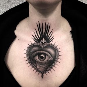 Sacred heart and eye tattoo by El Uf #ElUf #hearttattoos #blackandgrey #realism #realistic #illustrative #sacredheart #fire #heart #love #tear #linework #symbolism