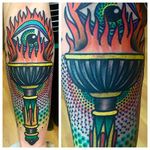 Vibrant torch tattoo by Tomas Garcia. #TomasGarcia #torch #neotraditional #dotwork