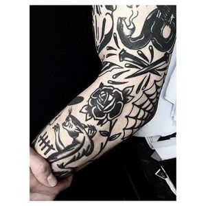 Blackwork tattoo sleeve by Matty D'Arienzo. #MattyDArienzo #blackwork #traditional #panther #rose #spiderweb #web #cobweb #nails