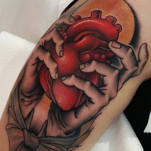 Hold my heart tattoo by Elia Leonardi #EliaLeonardi #hearttattoos #color #neotraditional #newtraditional #anatomicalheart #heart #hands #love #bow #leaves #sun