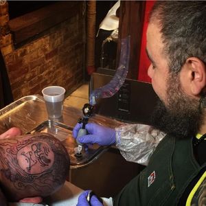 Rodrigo Melo tattooing a Fudo Myoo on one of his client's head (IG-rodrigomelotattoo). #bodysuits #FudoMyoo #Japanese #RodrigoMelo #traditional