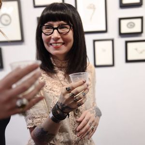 Zoe Bean at the opening reception for her solo art exhibition "Keepsake" at 8 of Swords Tattoo. Photo credit Ann Marie Amick (IG -- am_amick) cropped by Tattodo staff #eightofswords #zoebean #keepsake