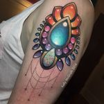 A dazzling piece of tattoo jewelry by Kelly McGrath (IG—kellymcgrathart). #colorful #gemstones #jewelry #KellyMcGrath #ornamental