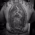 Sick back piece by Chuco Moreno #ChucoMoreno #oldschool #blackandgrey #religious #christian #VirginMary #Madonna #OurLadyOfGuadalupe #light #crown #prayer #angel #cherub #text #font #tattoooftheday