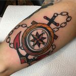A compass at an anchor's center by Adam Cornish (IG—adamcornishtattooer). #AdamCornish #anchor #compass #traditional