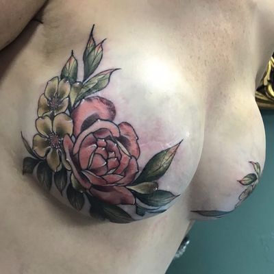 Mastectomy tattoo by Nikie Nouveau #NikieNouveau #CoverUpTattoos #mastectomytattoo #scarcoverup #flowers #bouquet #leaves #nature #magnolia #rose #color #pastel #tattoooftheday
