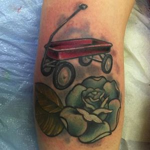 Little red wagon by Neil Faulkner (via IG -- goodtattoosforbadpeople) #neilfaulkner #wagon #redwagon #wagontattoo #redwagontattoo #Littleredwagontattoo