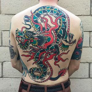 Beautiful tribute tattoo done by Joshua Marks. DaVita's back tattoo done Huck Spaulding. #JoshuaMarks #ETS #traditionaltattoos #boldtattoos #classic #dragon