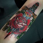 Elbow tattoo by Amanda Slater. #elbow #painful #traditional #traditionalamerican #traditional #rose #dagger #AmandaSlater