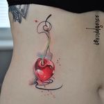 Watercolor cherry tattoo by Aleksandra Katsan. #cherry #fruit #watercolor #watercolortattoo #AleksandraKatsan