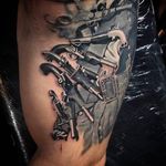 Awesome detail shot of guns on an upper leg tattoo done by Anastasia Forman. #AnastasiaForman #realistic #blackandgray #details #guns
