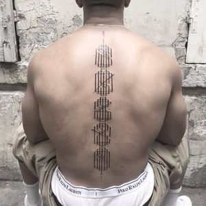 Spine monogram tattoo by Walter Hego #WalterHego #monogram #lettering #linework #calligraphy #ornamental